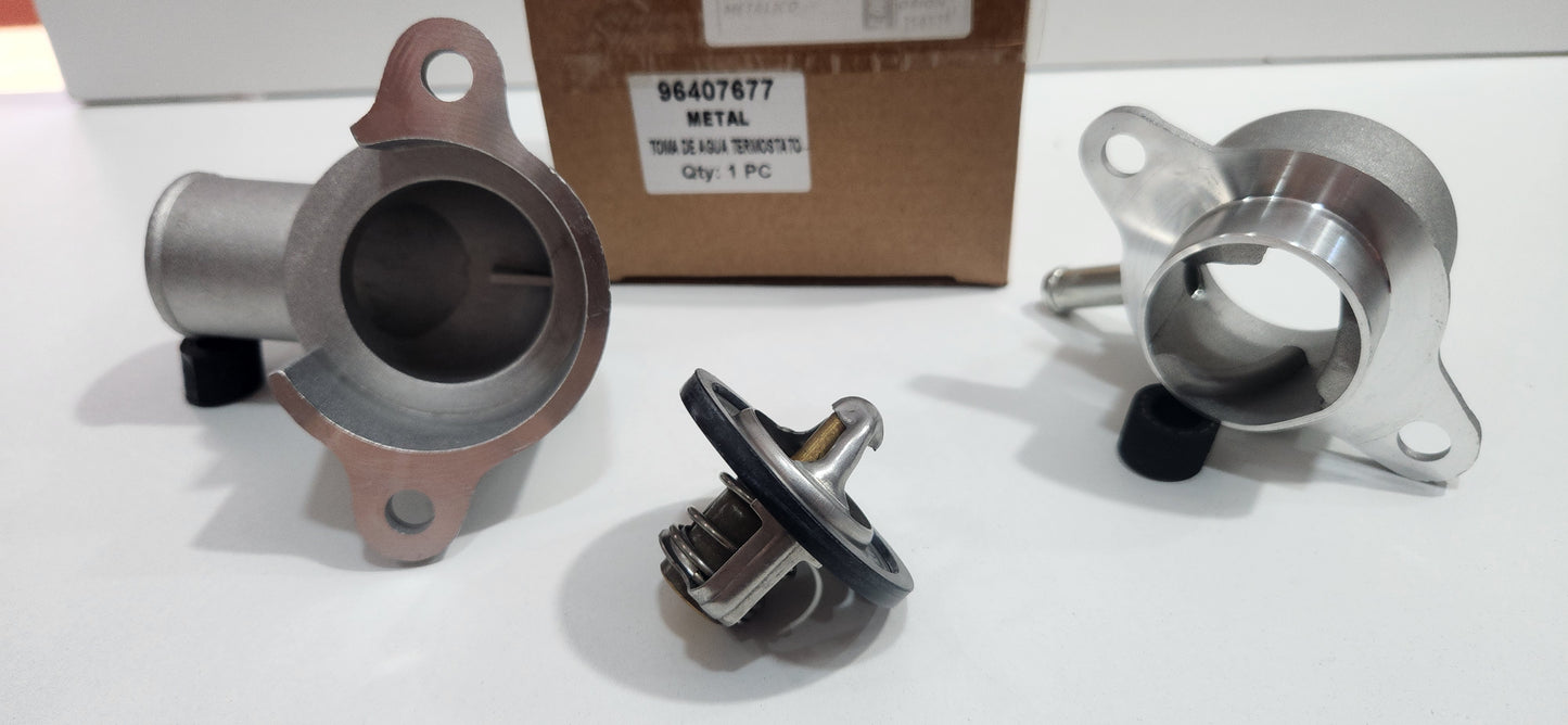 96407677 VALVULA DE TERMOSTATO DE REFRIGERANTE MOTTA AVEO CON TOMA DE AGUA